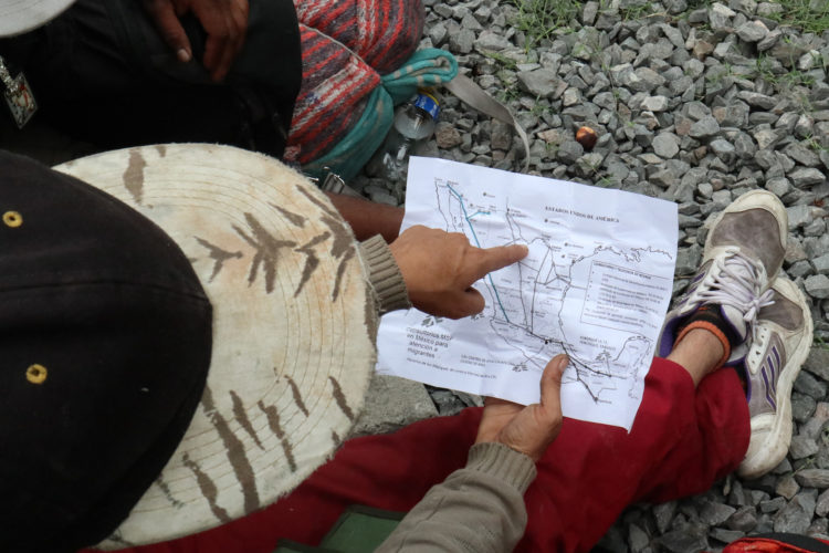 GUADALAJARA, MEXICO  07/11/2017: Enrique, a migrant from Honduras, uses a map given to him by a local shelter in Guadalajara which outlines the various freight train routes migrants can use on their journey to the United States to more quickly traverse the length of Mexico. This mode of travel is extremely dangerous and illegal. Guadalajara, roughly the midway between Central American and the U.S. border. Enrique says this this his 4th attempt to make it into the U.S., previous attempts resulted in being deported back to Honduras. If he makes it across, he plans to look for his a half-sister living in Trenton, NJ.

The journey to the United States is often long and involves several steps. Before migrants can get on the train they must travel from their homes through Central America to the Mexican border. Crossing the border is relatively easy as, even with increased surveillance, it is lightly patrolled and wide sections remain porous. Once in Mexico, migrants must then travel on foot or by vehicle to the nearest train terminal, where, usually after paying bribes or protection fees, they climb atop a railcar to start the first leg of their journey north. The travelers frequently change train lines along the way, often stopping at shelters run by civil-society organizations. Once they near the U.S. border migrants disembark and pay a smuggler (known as a “coyote”) to enter the United States. As the trains are subject to inspection and surveillance close to the border, it is nearly impossible for a migrant to cross the U.S.-Mexico border aboard the train.