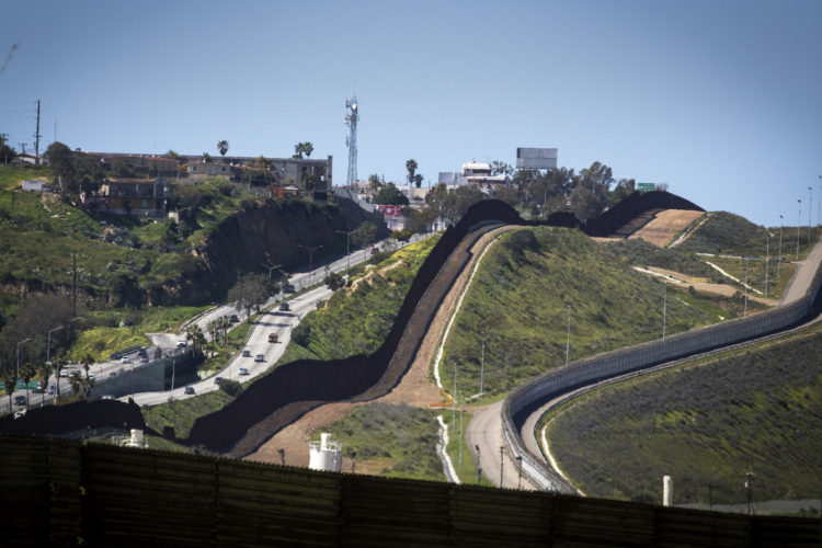 SAN YSIDRO, CA  03/12/2019: The border wall between Tijuana, Mexico on the left, and San Ysidro, CA on the right. The U.S.-Mexico border is 1,933 miles long, stretching from the Pacific Ocean to the Gulf of Mexico, roughly 700 of those miles have fencing currently in place.

In July 2019, the Supreme Court gave President Trump a victory in his fight for a wall along the Mexican border by allowing the administration to begin using $2.5 billion in Pentagon money for the construction


In the run-up to his election victory, Mr Trump promised to build a wall along the border's entire 2,000-mile length.He later clarified that it would only cover half of that - with nature, such as mountains and rivers, helping to take care of the rest. But, since Mr Trump entered the White House, although some of the already existing barriers have been replaced, work on extending the current barrier has only just begun