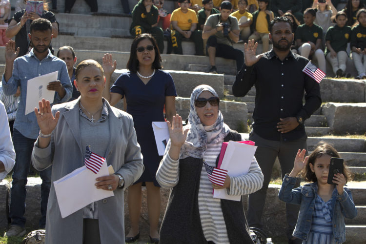 PATERSON, NJ  10-02-2019 NATURALIZATION CEREMONY AT GREAT FALLS:  Rachida El Ghyati of Paterson takes the Oath of Allegiance to the United States. She is from Morocco. The Paterson Great Falls National Historical Park (NPS), in partnership with U.S. Citizenship and Immigration Services (USCIS), held a naturalization ceremony in the park’s new amphitheater where 40 new citizens, mostly residents of Paterson, took the Oath of Allegiance to the United States.