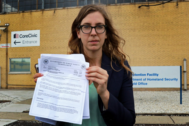 NEWARK, NJ  07-25-2018: Lauren Major, a detention attorney for the Newark chapter of the non-profit American Friends Service Committee represents Daniel Castro, an undocumented Newark man who was turned over to ICE by Newark police in June 2018. She is holding a copy of a Newark Police Department memorandum on the city's Sanctuary City policy, which outlines why he should not have been turned over to ICE -a violation of Newarks' own policy. Castro, who is undocumented but has no criminal record and did not commit any offense the evening of his arrest, was falsely arrested, and Newark Police admit they made a mistake in violating the city's own Sanctuary City policy. On the night of his arrest, Castro was returning from shopping for baby formula when he was stopped by police and reluctantly gave his name when they arrested him for an outstanding ICE warrant from many years ago for which he said he was never notified. After many months of being held at the Elizabeth Detention Center (ICE) he was deported to his native Nicaragua where he currently awaiting a status hearing in New Jersey. The couple has a 9-month old baby boy, Ismael, and since Danny's arrest Serrano has been living with her mother, sisters, and their young children in a small apartment in Newark, and says she cannot support herself and the baby without government and family assistance.