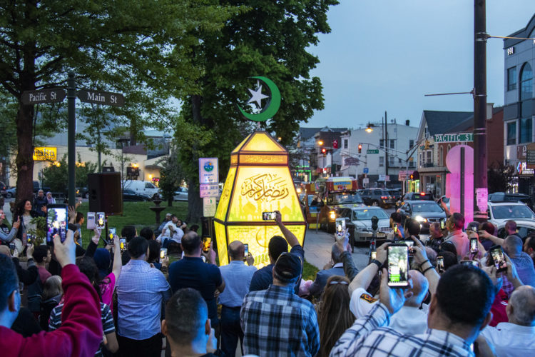 PATERSON, NJ  05-04-19: At dusk on the eve of Ramadan a giant fanous, or lantern, was illuminated at the South Paterson Park on Main Street to usher in the holy month. After a ceremony led by Andre Sayegh, the city's first Arab-American mayor, people gathered to have their photo taken. 6th Ward Paterson Councilman Al Abdellaziz, who helped start the tradition four years ago, said, "We want this to become a destination, "it's like the Muslim Rockefeller Center Christmas tree."