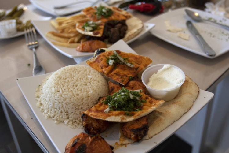 04-17-19 PATERSON, NJ:  A mixed dish is served at Nouri.Cafe, a Mediterranean corner-cafe on Main Street in South Paterson that specializes in Middle Eastern brick-oven baked goods as well homemade grilled specialities, salads, and sandwiches.