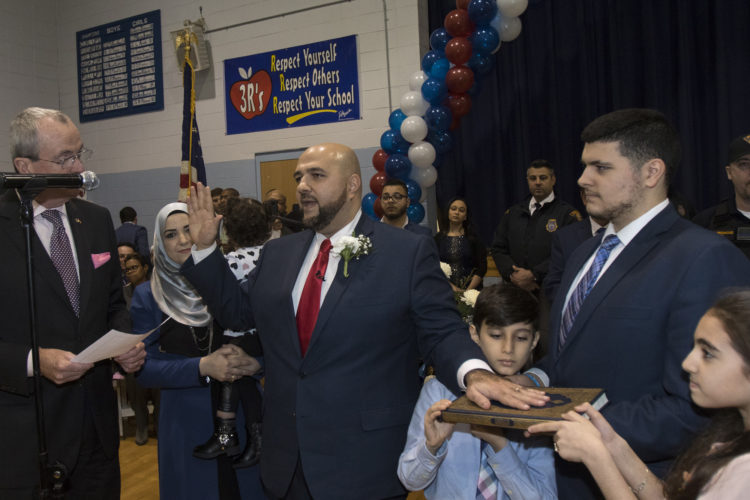 PROSPECT PARK, NJ  01-05-2019: Mohamed T. Khairullah was sworn-in by NJ Governor Phil Murphy after being elected to his fourth term as mayor of Prospect Park, NJ . Khairullah, who was born in Syria and came to the US as a refugee has become an outspoken leader in the Syrian-American community in here in the U.S. and abroad. "Act Locally, Think Globally" was his main slogan during his recent re-election campaign. In addition to the governor, the ceremony was attended by roughly 250 people at Prospect Park School #1, including many several elected officials from around the region the Turkish Consul General was in attendance.Prospect Park has a population of just under 6,000 people, The borough is less than half a square mile, the smallest in Passaic County, and is located near the city of Paterson.